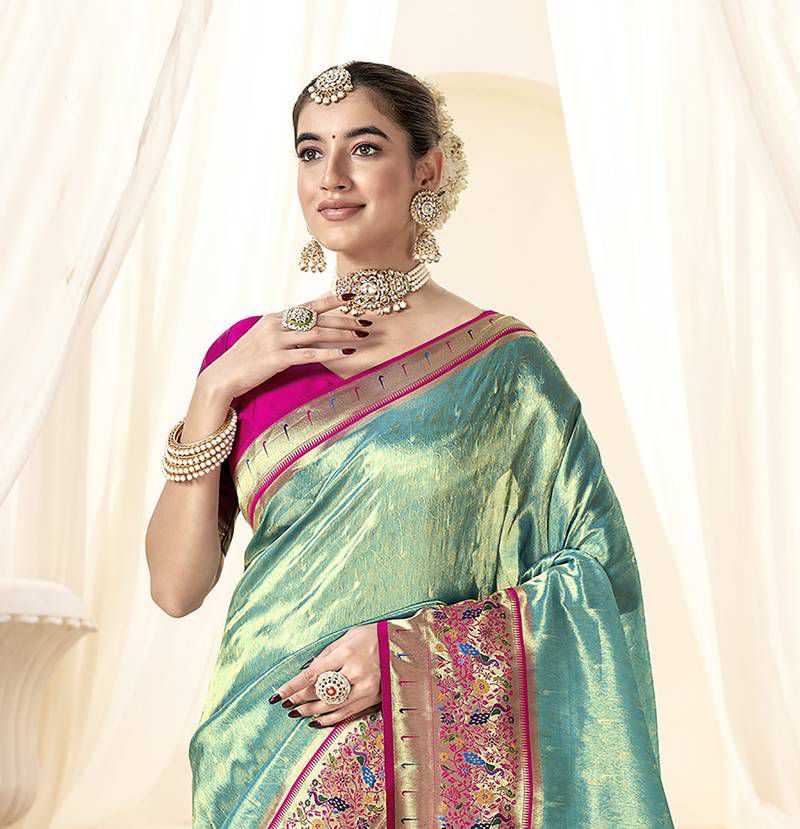 Sea green soft tissue paithani silk saree with zari weaving work