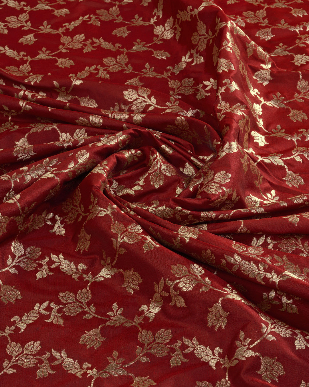 Maroon color pure silk saree with zari weaving work
