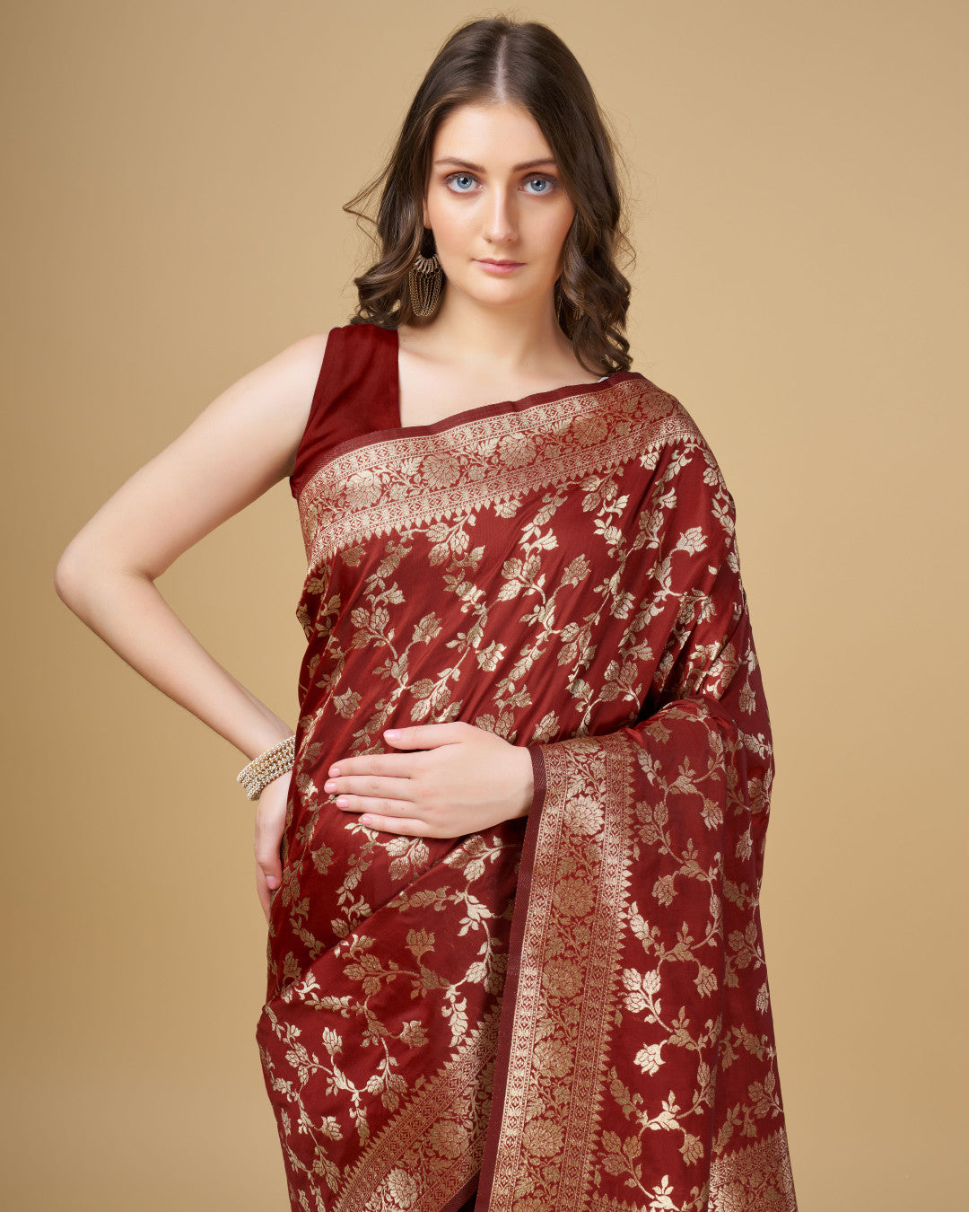 Maroon color pure silk saree with zari weaving work