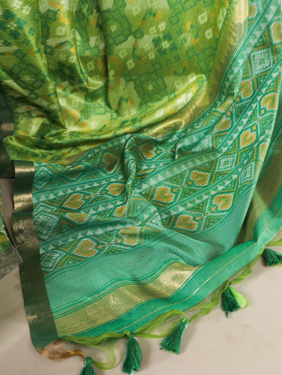 Pista green khadi raw silk saree with patola weaving work