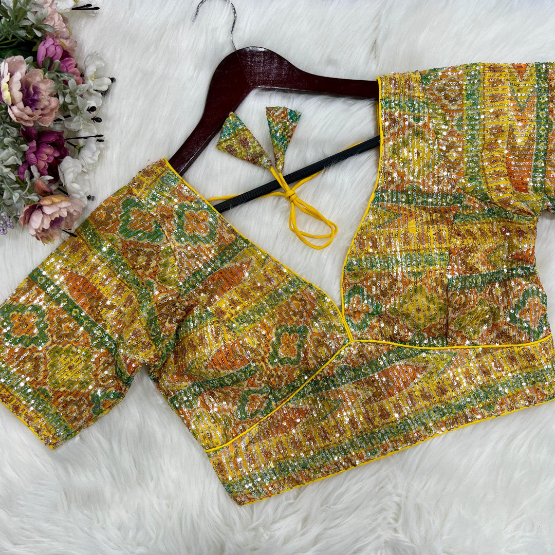 Yellow party wear heavy net readymade blouse with sequence work