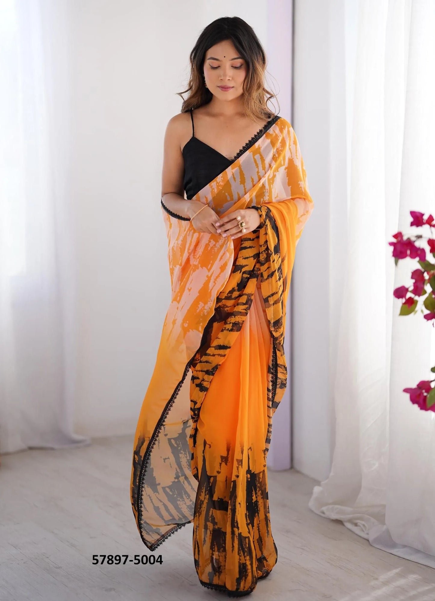 Orange Georgette Fashionable Saree For Kitty-Parties