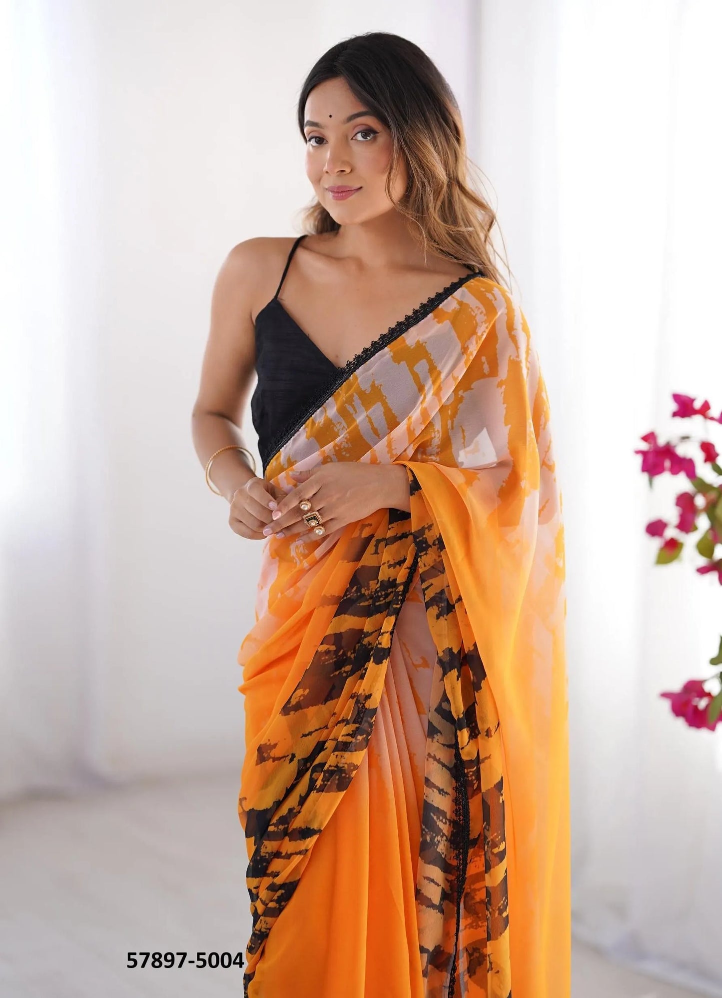 Orange Georgette Fashionable Saree For Kitty-Parties