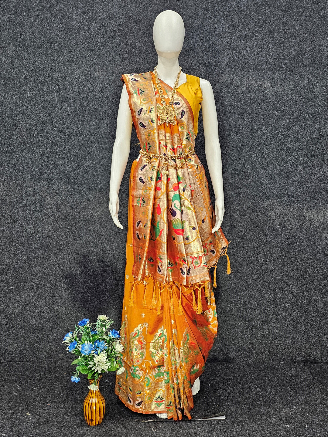 Mustard yellow paithani silk saree with zari weaving work