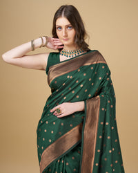 Dark green color paithani silk saree with copper zari weaving work