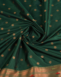 Dark green color paithani silk saree with copper zari weaving work