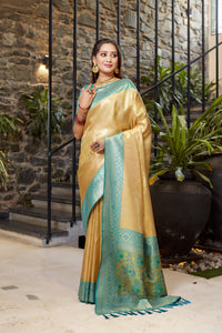 Soft flowy beige color tissue silk saree with contrast woven border & blouse