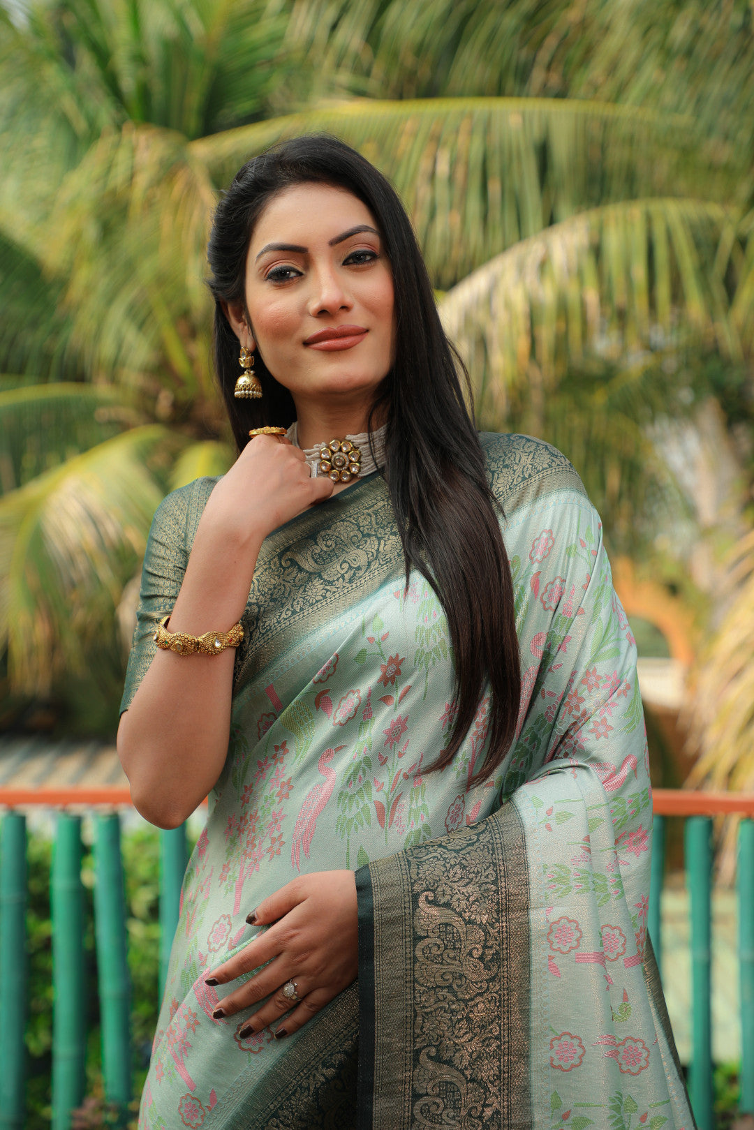 Sea green color kanjivaram silk saree with zari weaving work