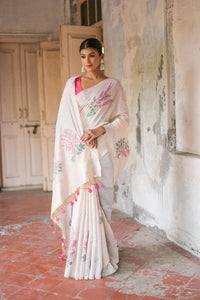 Off white color soft muga silk saree with weaving work