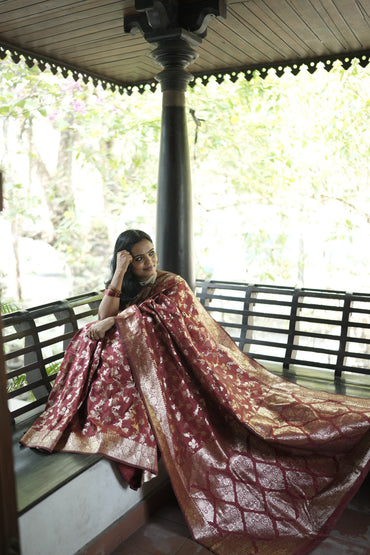 Maroon pure silk saree with zari weaving work