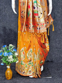Mustard yellow paithani silk saree with zari weaving work
