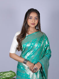 Green color banarasi silk saree with zari weaving work