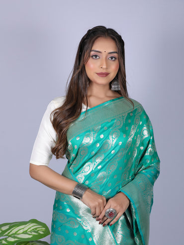 Green color banarasi silk saree with zari weaving work