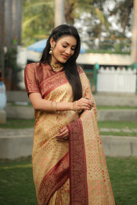 Beige color kanjivaram silk saree with zari weaving work