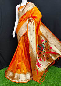 Orange color paithani silk saree with zari weaving work