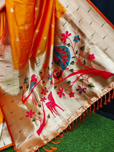 Orange color paithani silk saree with zari weaving work