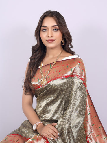 Gray color tissue silk saree with zari weaving work