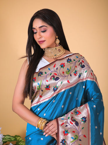 Rama green color paithani silk saree with zari weaving work