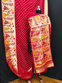 Red color bandhej silk saree with zari weaving work