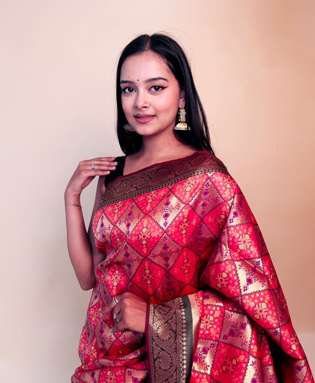 Gajari color banarasi silk saree with patola weaving work