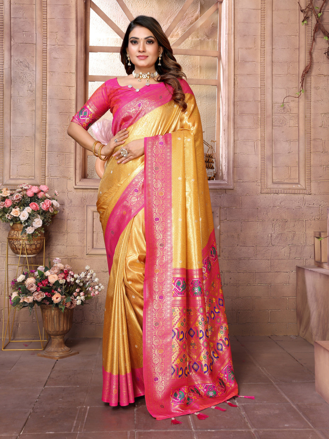 Yellow soft tissue paithani silk saree with zari weaving work