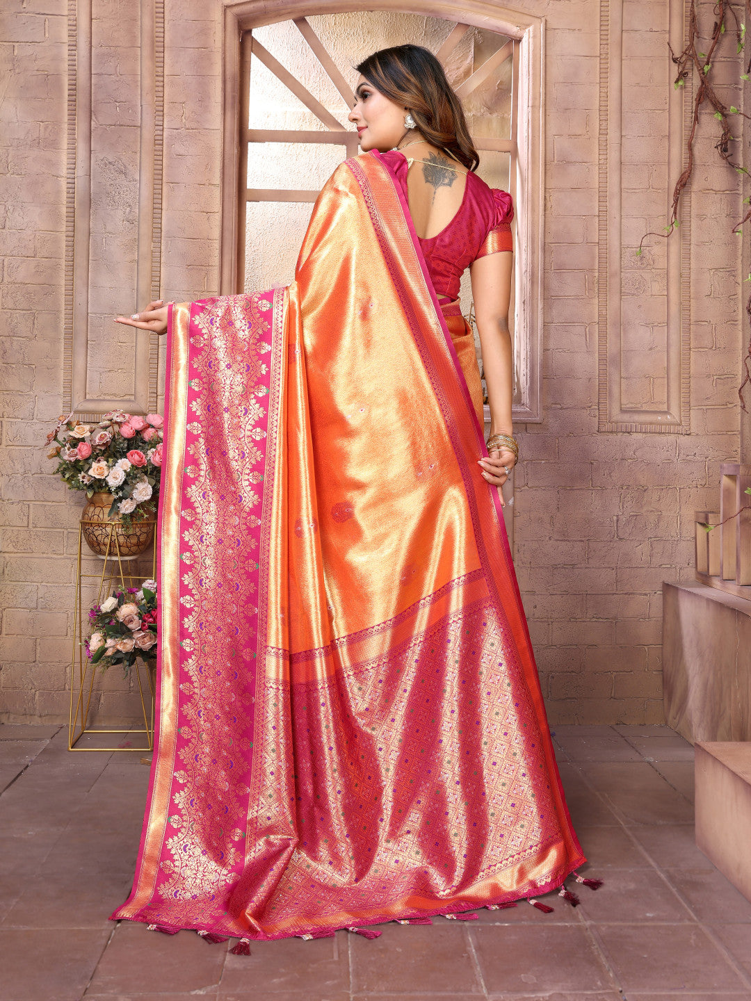 Orange kanchipuram banarasi tissue silk saree with zari weaving work
