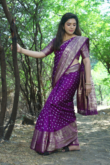 Magenta color bandhej silk saree with zari weaving work