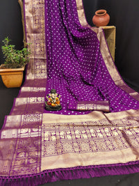 Magenta color bandhej silk saree with zari weaving work