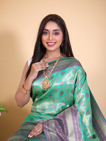 Sea green and purple color tissue silk saree with zari weaving work