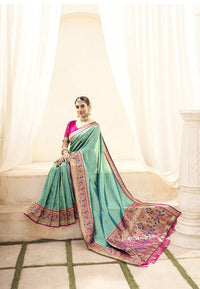 Sea green soft tissue paithani silk saree with zari weaving work