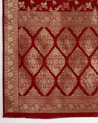 Maroon color pure silk saree with zari weaving work
