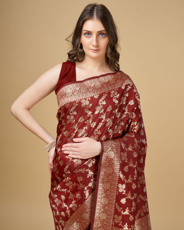 Maroon color pure silk saree with zari weaving work