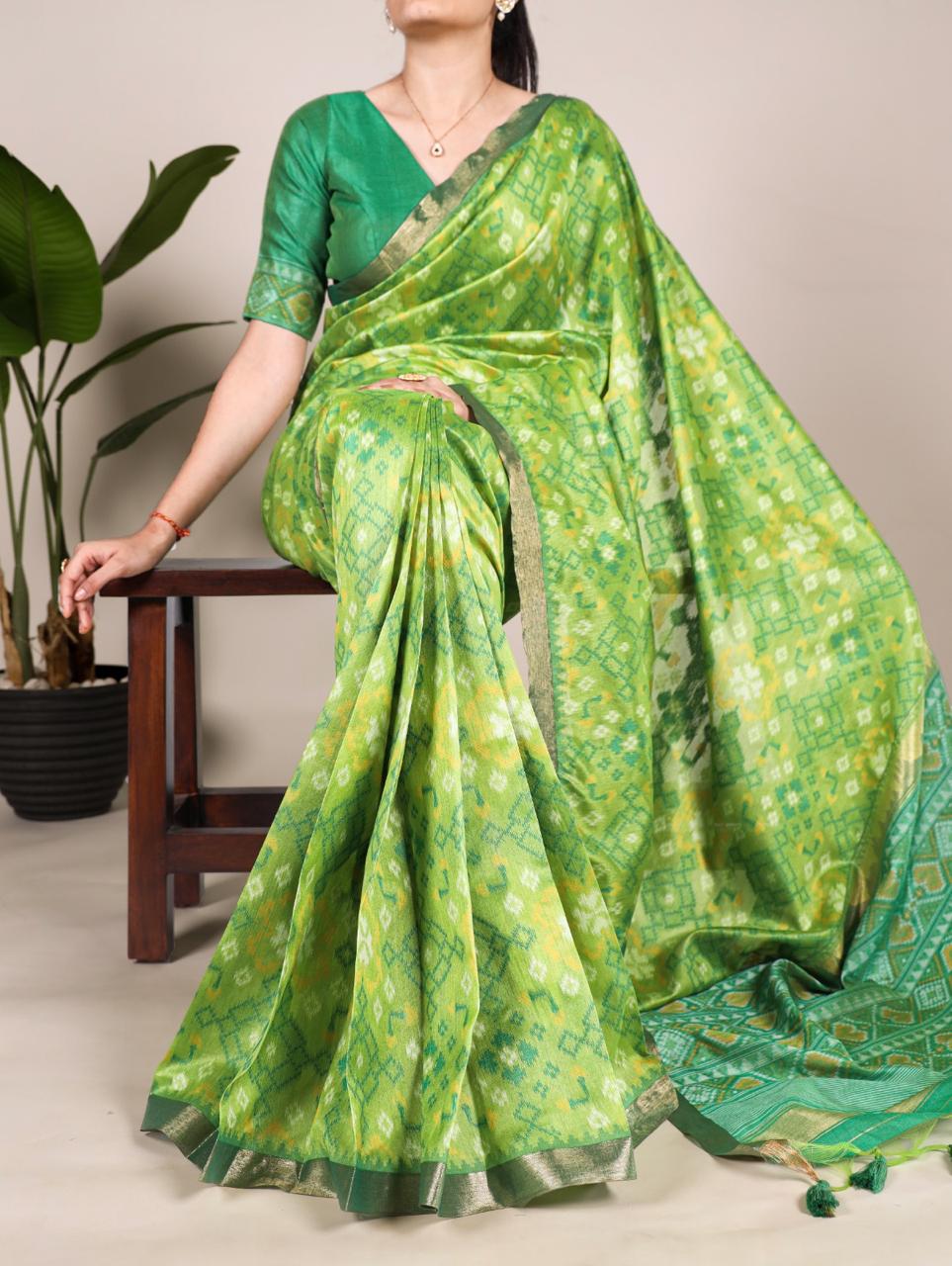 Pista green khadi raw silk saree with patola weaving work