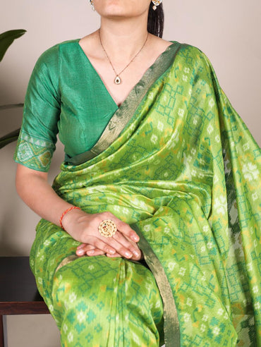 Pista green khadi raw silk saree with patola weaving work