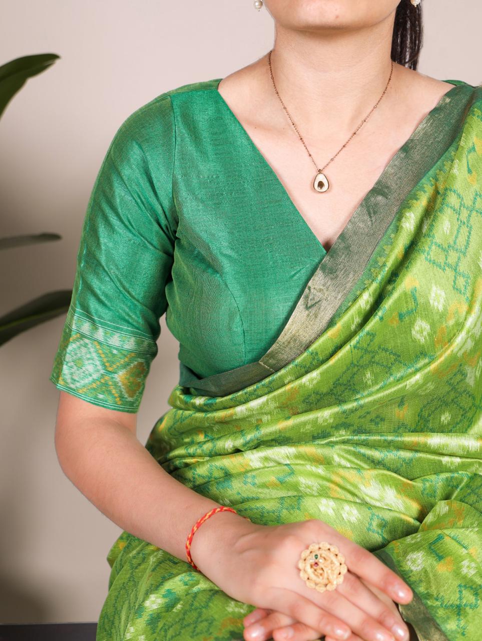 Pista green khadi raw silk saree with patola weaving work