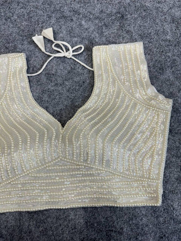Off white soft silk readymade blouse with handcrafted pearl & pipe work