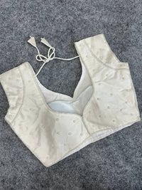 Off white soft silk readymade blouse with handcrafted pearl & pipe work