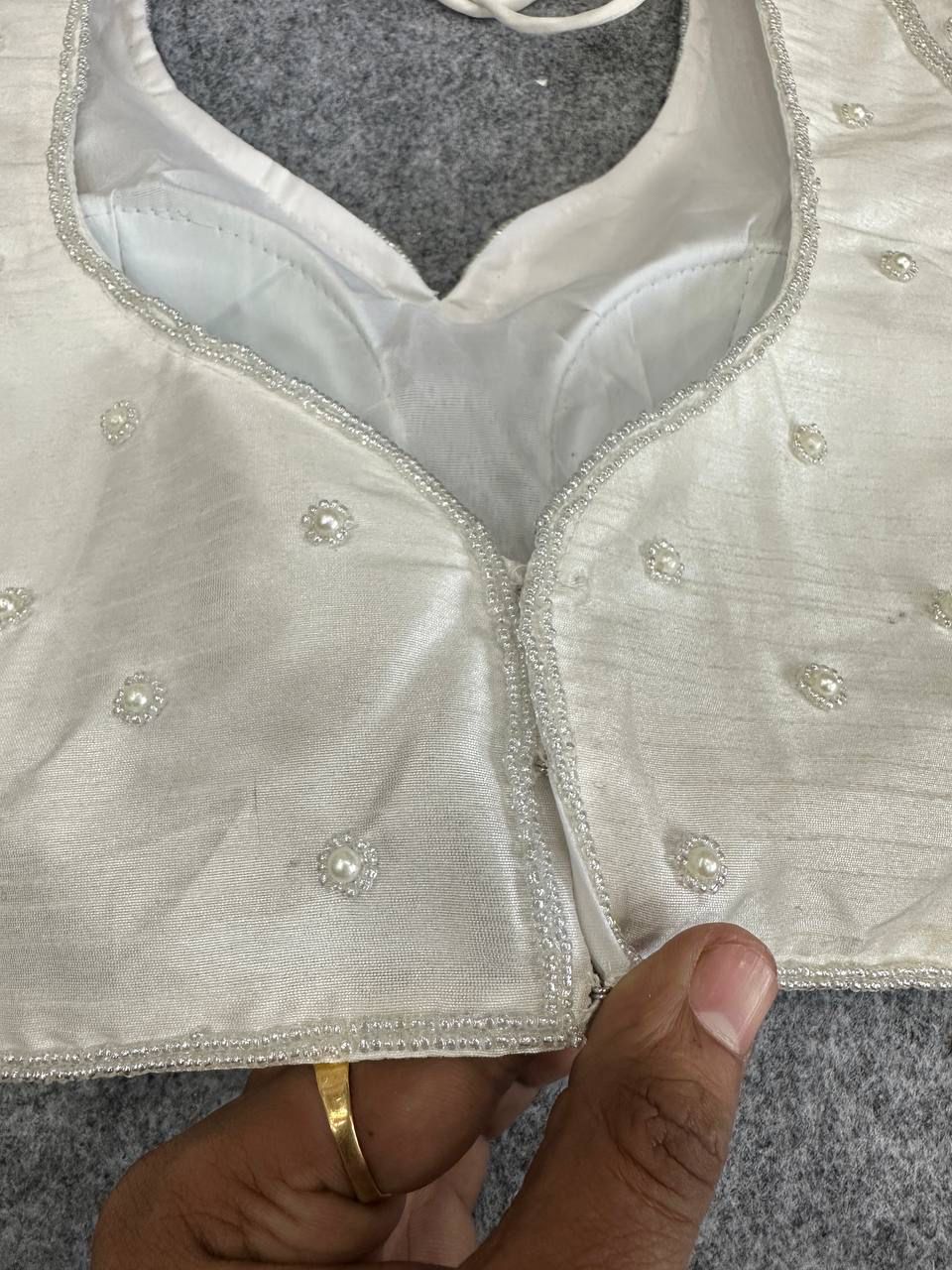 Off white soft silk readymade blouse with handcrafted pearl & pipe work