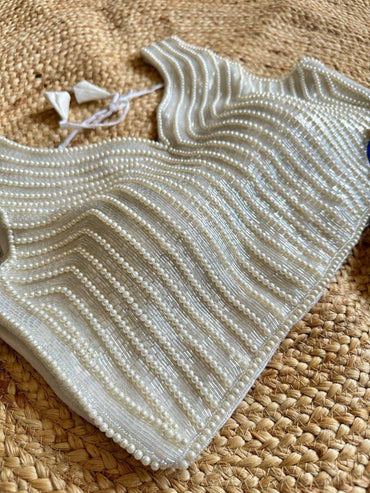 White fancy soft silk readymade blouse with handcrafted pearl work