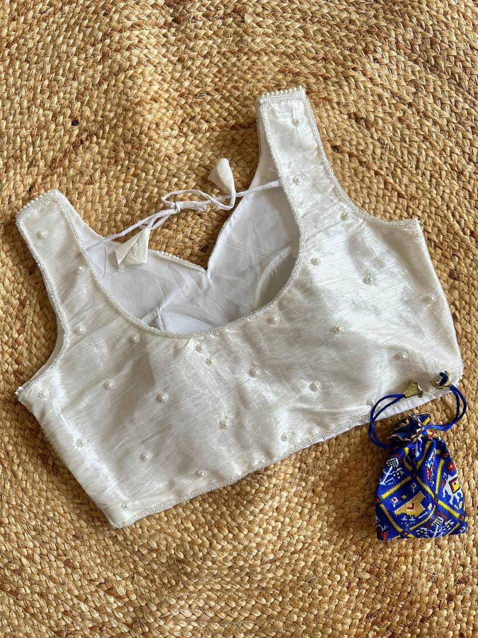 White fancy soft silk readymade blouse with handcrafted pearl work