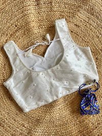 White fancy soft silk readymade blouse with handcrafted pearl work