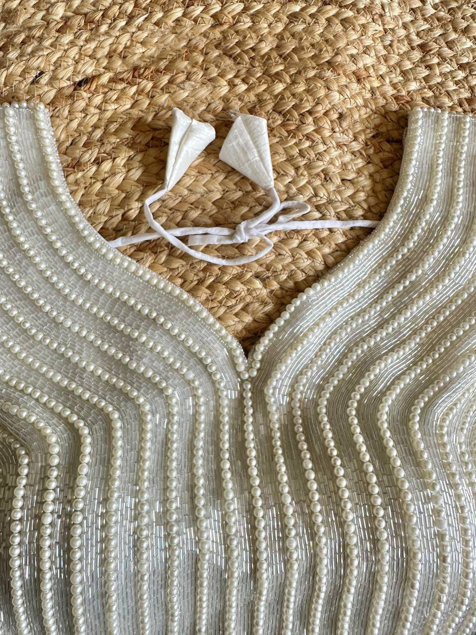 White fancy soft silk readymade blouse with handcrafted pearl work