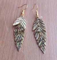 Gold Feather Leaf Brass Dangle Earrings with Detailed Cutout Design