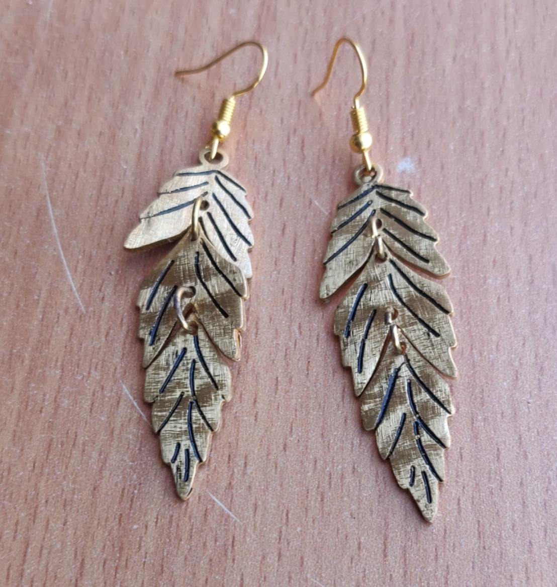 Gold Feather Leaf Brass Dangle Earrings with Detailed Cutout Design